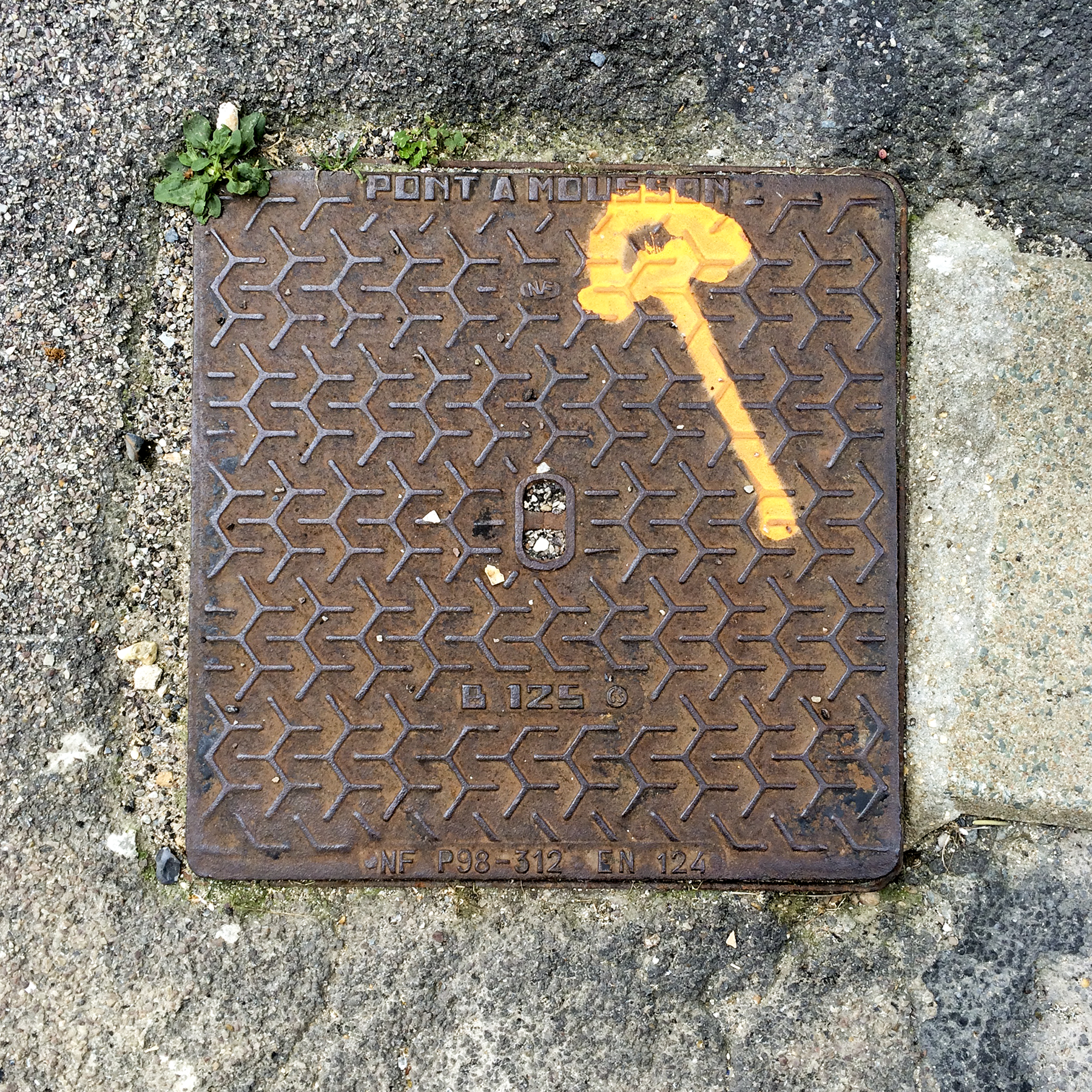 6th of 6 placeholder images: yellow arrow spraypainted on pavement